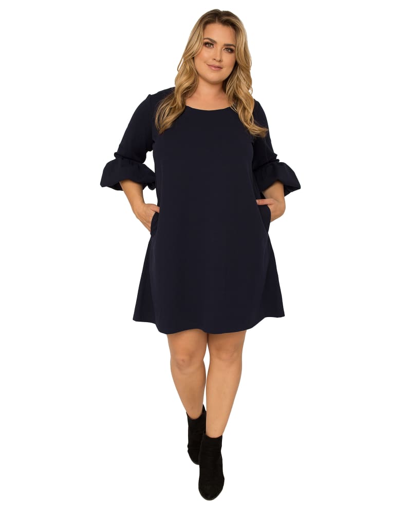 Front of a model wearing a size 1X Tenley Balloon Sleeve Midi Dress in Navy by Standards & Practices. | dia_product_style_image_id:280593
